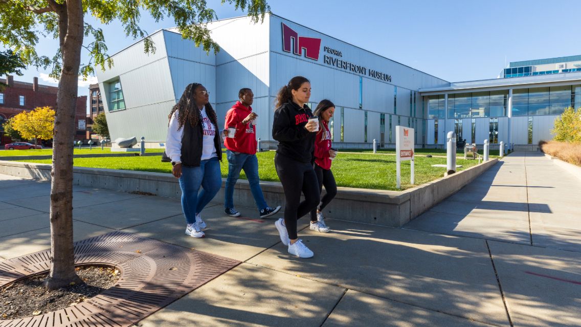 Bradley students walk to the Peoria Riverfront Museum
