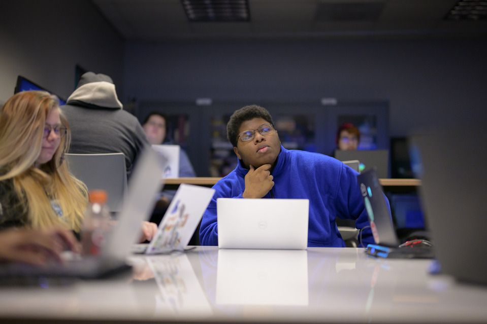 Bradley students participate and engage in a game coding class.