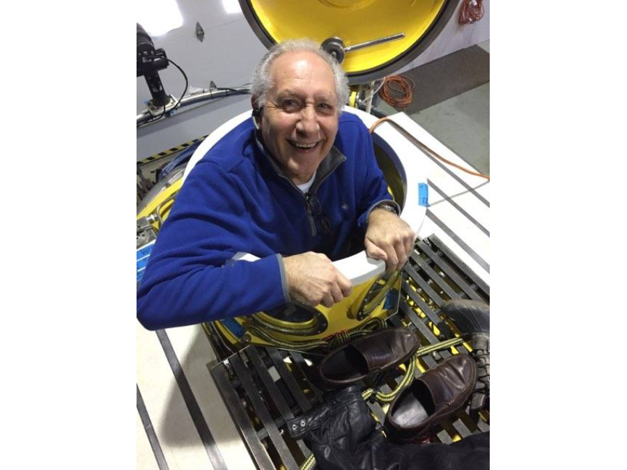 Harry Truitt '70 stepping out of an Oceangate mini submarine