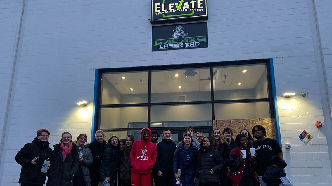 Students in front of indoor trampoline park