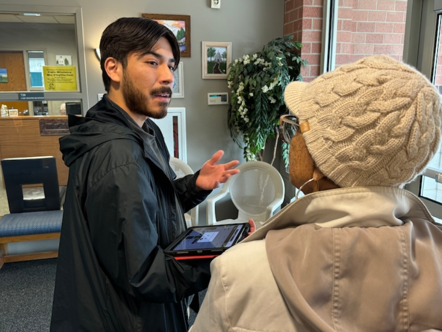 PeoriaFresh team member Brian Sida explains the benefits of using their platform to request produce for food banks